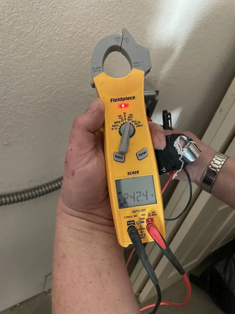 Voltage testing with clamp meter during Generator Installation in Redlands